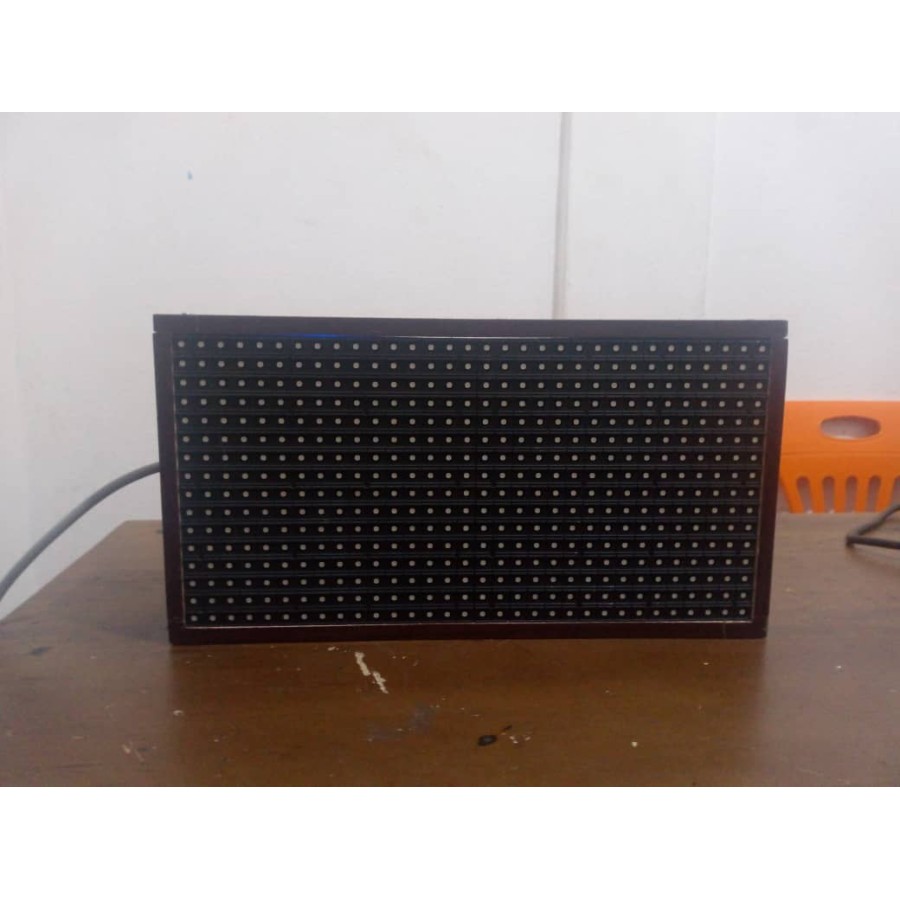 16x32 matrix digital advertising display with dynamic messages, easily updated via mobile app.